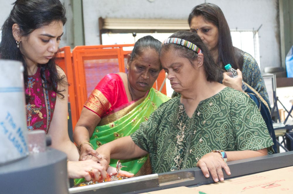 Women collaborating on a project at work.