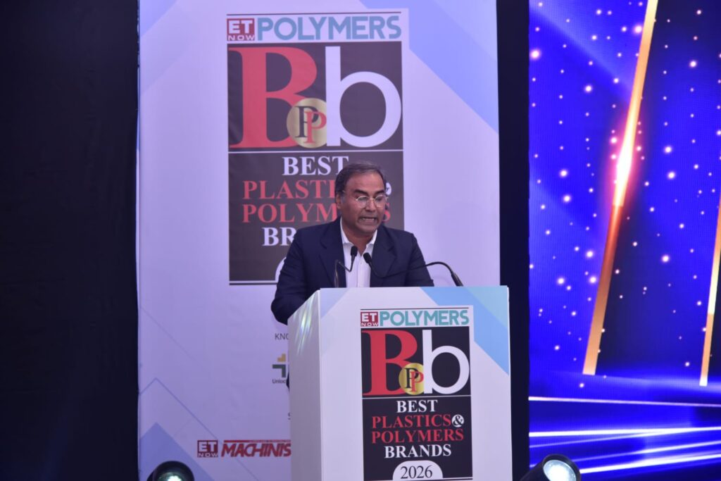 Speaker at Best Plastics and Polymers Brands event podium