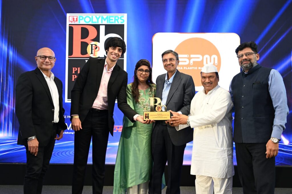 Six attendees pose with award at polymers event
