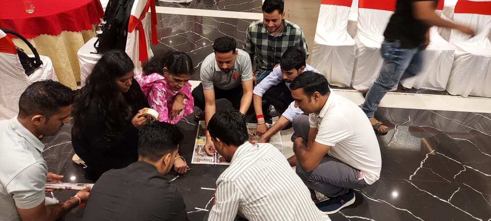 Guests gathered on floor playing a board game